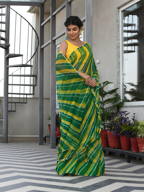 MULMUL TRIKAA GREEN-YELLOW LEHERIYA CHIFFON SAREE MULMUL TRIKAA GREEN-YELLOW LEHERIYA CHIFFON SAREE